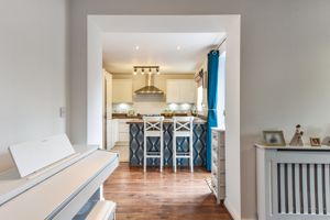 Open Plan Access From Kitchen to Family Room- click for photo gallery